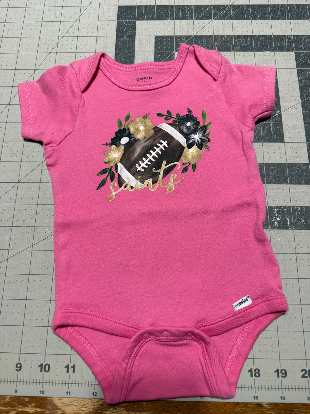 6-9mo saints girls bodysuit